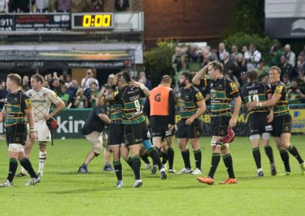GET IN THERE! - Saints celebrate the win over Leicester on Friday. Tom Wood now wants them to follow up with some silverware (Picture: James Phillips)
