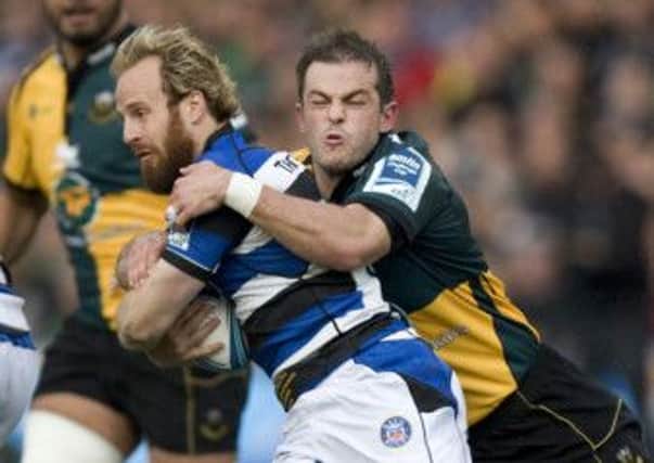 TROPHY DELIGHT - Stephen Myler tackles Bath's Nick Abendanon during the Amlin Challenge Cup Final (Picture: Linda Dawson)