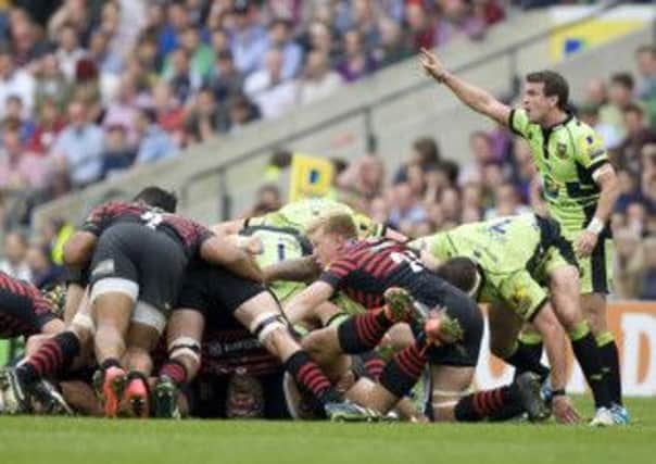 GLAD TO BE PART OF IT - Lee Dickson (right) in action against Saracens at Twickenham on Saturday (Picture: Linda Dawson)