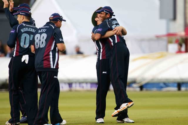 Muhammad Azharullah is congratulated after catching Paul Collingwood for a golden duck