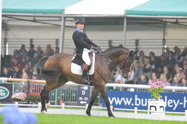 Burghley Horse Trials 2014.   Simon Grieve  riding Cornacrew in the dressage. EMN-140409-105302009