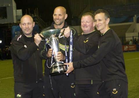 STAYING PUT - the Saints coaching team of Alan King, Jim Mallinder, Dorian West and Alan Dickens (Picture: Linda Dawson)