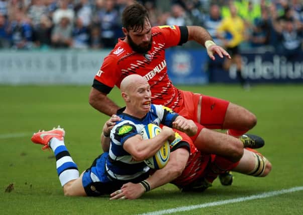 Leicester's Tom Croft and Niall Morris fail to stop Bath's Peter Stringer from scoring a try during their Premiership clash last weekend