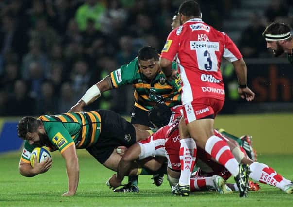 TURNING UP THE POWER - Salesi Ma'afu and Alex Corbisiero get stuck into Gloucester at Franklin's Gardens three weeks ago (Picture: Sharon Lucey)