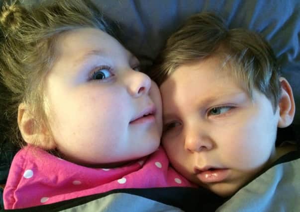 Mia and Cory Blakey-Tew, who suffer from a rare genetic condition