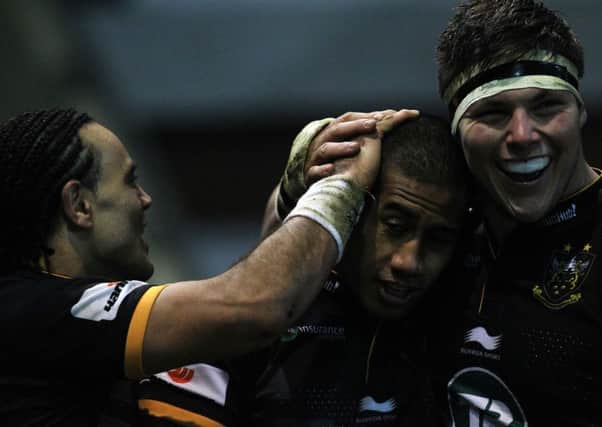 HAT-TRICK HERO - Ken Pisi (centre) is congratulated by Kahn Fotuali'i and Ethan Waller (picture: Sharon Lucey)