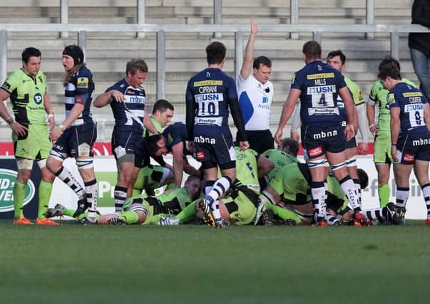 BAD DAY - Sale Sharks get over the line to score a try against Saints on Saturday (Picture: Sharon Lucey)