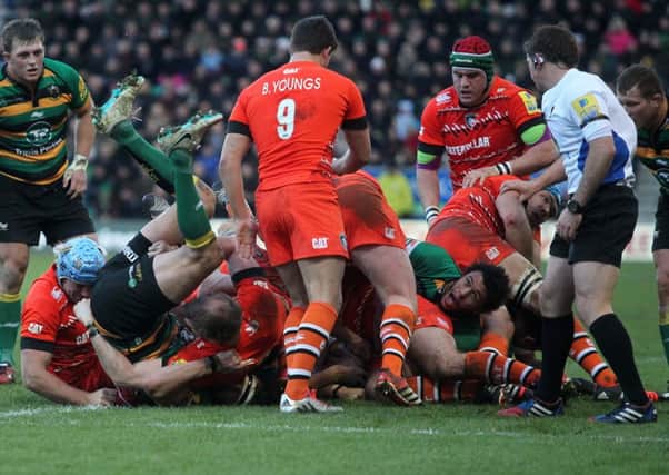 INJURY WOE - Courtney Lawes picked up an ankle injury in this game against Leicester (picture: Sharon Lucey)