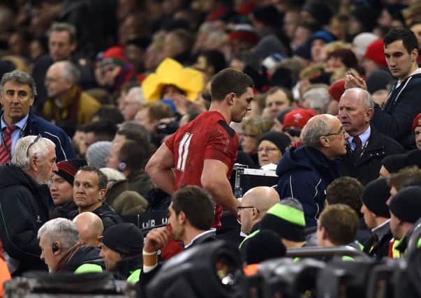 Wales' George North leaves the field to be assessed after a head injury during the RBS 6 Nations match against England at the Millennium Stadium last Friday