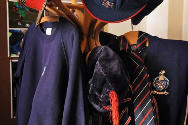 JPCT 240514 S14220198x Steyning festival. Steyning Grammar School. 400th anniversary reunion. Old uniforms in the Chatfield display exhibition room -photo by Steve Cobb SUS-140527-100210001
