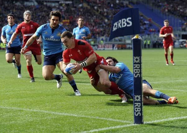 Wales' George North runs in to score his second and his side's fourth try
