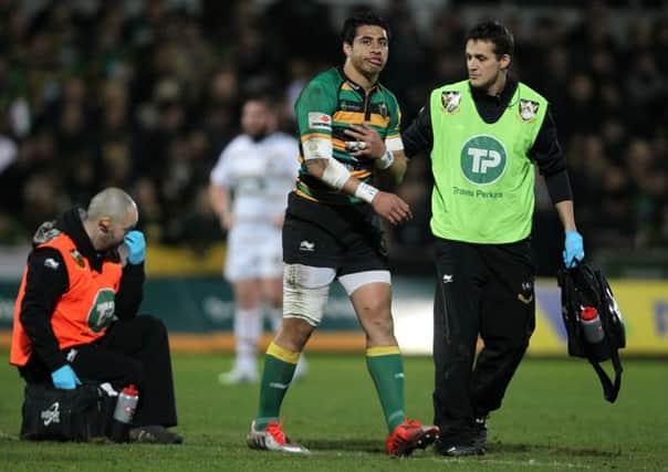 OUCH! - George Pisi leaves the field on Friday night after breaking a finger (Picture: Sharon Lucey)