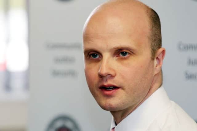 Adam Simmonds has pledged £10,000 to the Neighbourhood Watch group from his department's funds
