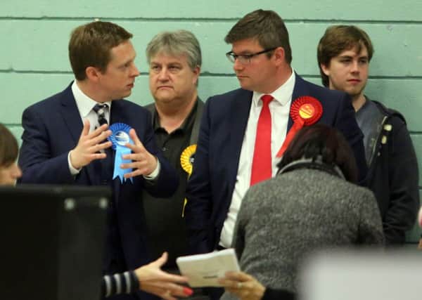 General Election: Corby: Counting votes at Lodge Park Sports Centre for Corby and East Northants
Tom Pursglove (Conservative) and Andy Sawford (Labour) chat animatedly
Friday May 8th 2015 NNL-150805-043634009