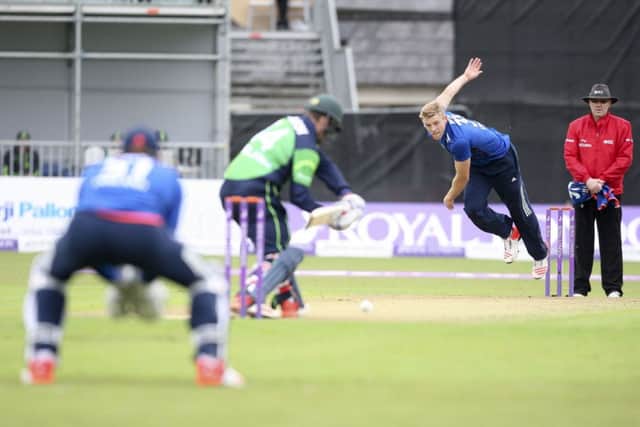 England's David Willey bowls to Ireland's Gary Wilson