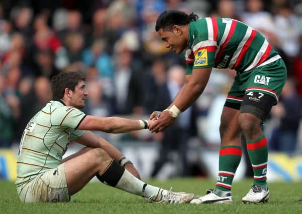 PAINFUL MEMORY - Leicester's Manu Tuilagi consoles Saints' James Downey at the end of the 2011 Premiership semi-final at Welford Road