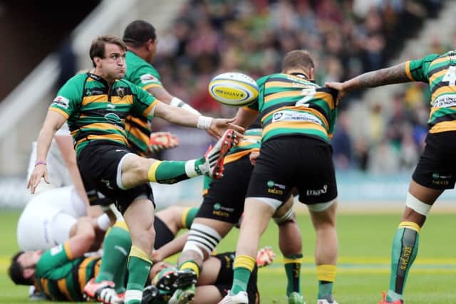 Lee Dickson tried to box-kick Saints out of danger