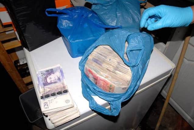More cash uncovered from the Palk Road lock-up.