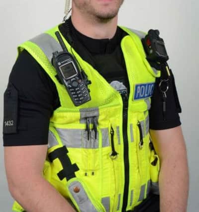A picture taken by a passerby of PC Chris Stevens helping an elderly man home has been shared and liked on Facebook by thousands of people, with many commending him for his actions.