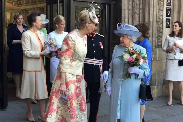 Diana Birch escorting HM Queen. Photo by Andy Lane.