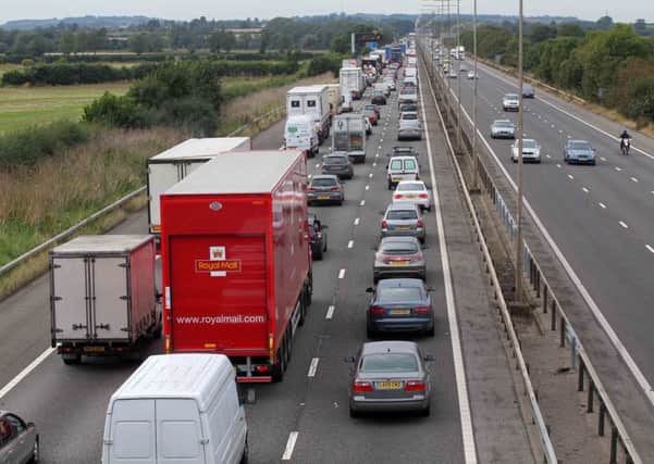 Traffic queuing on the M1 northbound between junction 15a and 16 after an earlier lorry fire. ENGNNL00120120920184213