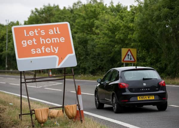 The new road signs being trialled on the M1 are designed to make people drive safer through the road works. Photo: SWNS