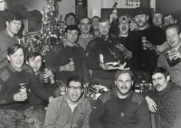 A group of soldiers inside Piggery Ridge camp in Creggan at Christmas, 1973 NNL-150728-110402001