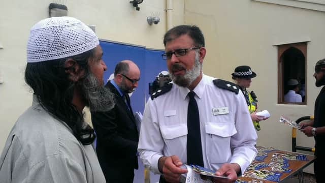 Inspector Inam Khan, the forces equality and diversity officer, speaks to members of Northampton Central Mosque at the recruiting event this afternoon.