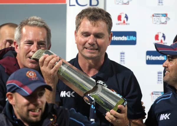 THE SMILE SAYS IT ALL - David Ripley lifts the Twenty20 trophy in 2013