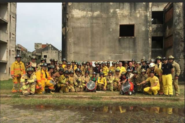 Dan Moore and Steve Bell from Northamptonshire Fire and Rescue Service with the Volunteer Fire Corps of Paraguay