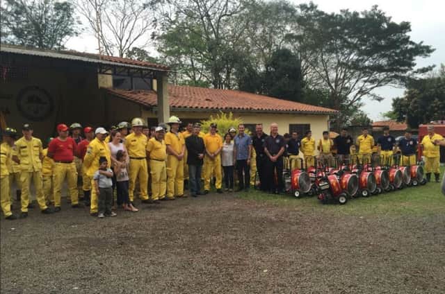 Dan Moore and Steve Bell from Northamptonshire Fire and Rescue Service with the Volunteer Fire Corps of Paraguay.