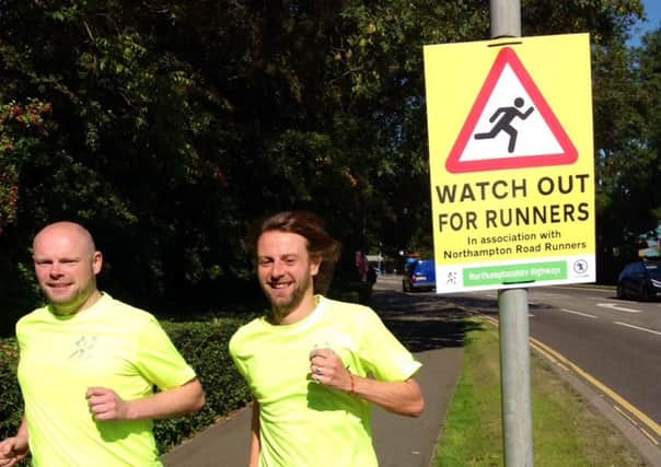 The new signs to help alert drivers to popular running routes