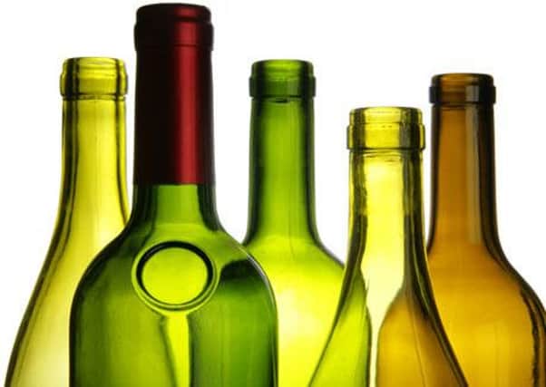 Wine bottles close-up isolated over white background ENGPNL00420120222100649