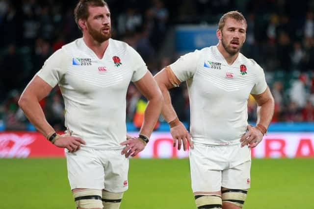 England captain Chris Robshaw (right) and Tom Wood leave the field dejected after the Rugby World Cup match at Twickenham Stadium, London. PRESS ASSOCIATION Photo. Picture date: Saturday September 26, 2015. See PA story RUGBYU England. Photo credit should read: David Davies/PA Wire. RESTRICTIONS: Editorial use only. Strictly no commercial use or association without RWCL permission. Still image use only. Use implies acceptance of Section 6 of RWC 2015 T&Cs at: http://bit.ly/1MPElTL Call +44 (0)1158 447447 for further info.