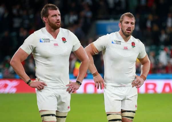 England captain Chris Robshaw (right) and Tom Wood leave the field dejected after the Rugby World Cup match at Twickenham Stadium, London. PRESS ASSOCIATION Photo. Picture date: Saturday September 26, 2015. See PA story RUGBYU England. Photo credit should read: David Davies/PA Wire. RESTRICTIONS: Editorial use only. Strictly no commercial use or association without RWCL permission. Still image use only. Use implies acceptance of Section 6 of RWC 2015 T&Cs at: http://bit.ly/1MPElTL Call +44 (0)1158 447447 for further info.