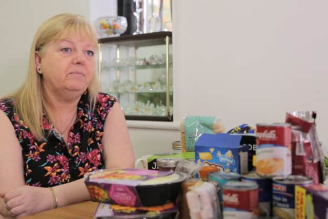 Margaret Nuttall with a selection of foods that she consumes now her children have left home/ Photo: SWNS