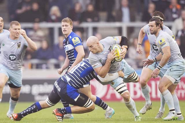 Sam Dickinson tried to power past Sale