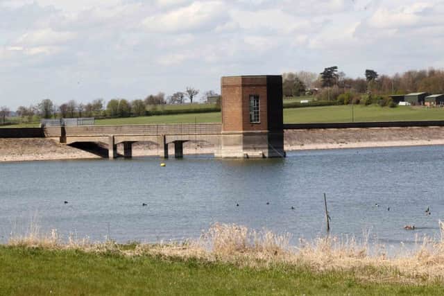 A pilot died after a microlight crashed into a field near Pitsford Reservoir