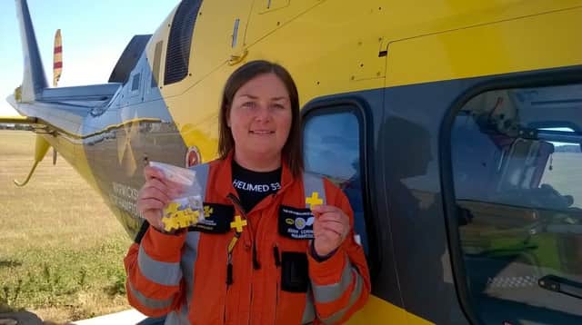 Jenny Conway selling Air ambulance Week badges