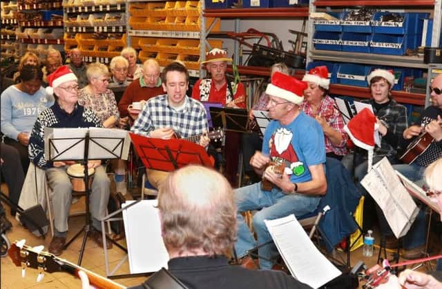 Tools For Self Reliance Christmas party with the Raunds Ukulele Orchestra