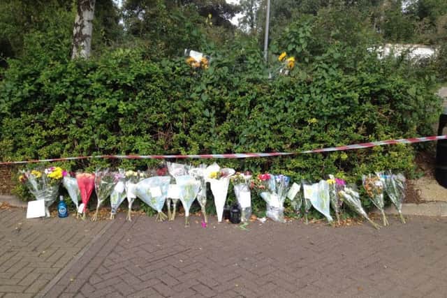Flowers left in memory of Lorenzo Gallucci in the Splash car park in Rushden