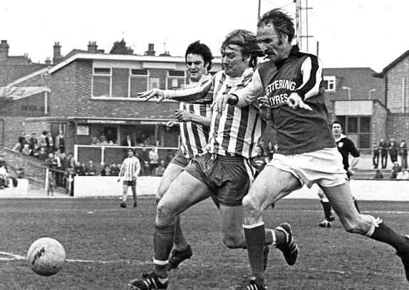Kettering Town's clash with Bath City made history as the first club in the UK to wear shirt sponsors.
