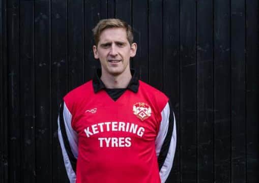 First team coach Steve Kinniburgh with the specially-designed shirt.