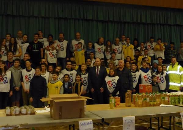 Members of The Church of Jesus Christ of Latter-Day Saints from congregations in Northamptonshire, Milton Keynes, Bedfordshire and Cambridgeshire collected aid for refugees in Calais