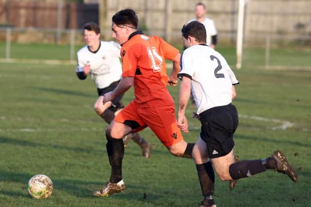 Action from Rushden & Higham United's 4-1 success over Bugbrooke in Division One