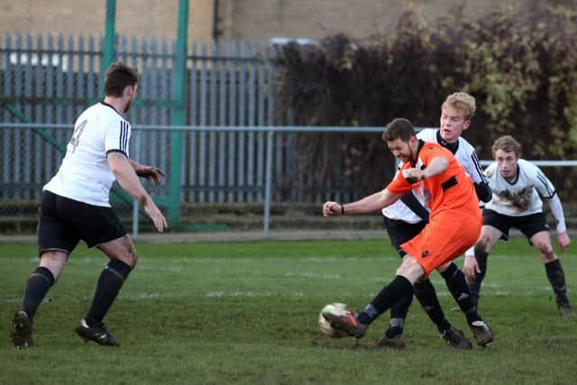 Jack Dyson scores Rushden & Higham's second goal against Bugbrooke
