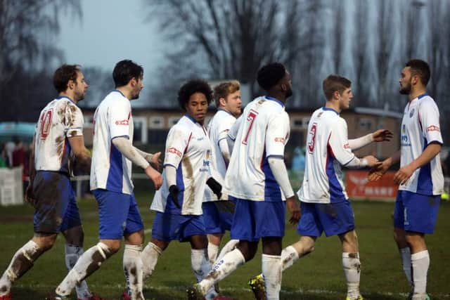 The AFC Rushden & Diamonds players celebrate one of their goals at the Dog & Duck