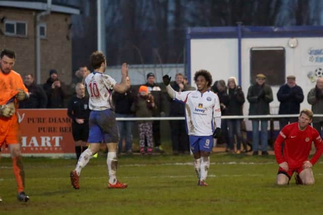 Jon Stevenson takes the congratulations after scoring on his debut for AFC Rushden & Diamonds