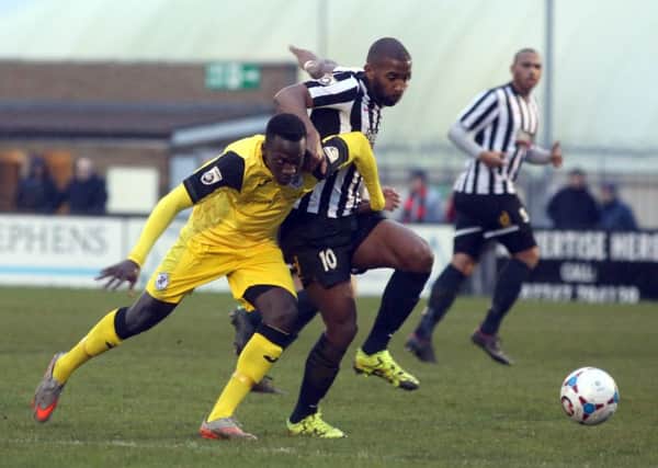 Duane Courtney headed Corby Town in front as they picked up a crucial 2-1 success at Worcester City