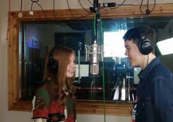 Vicki-Louise and Charlie recording the single.